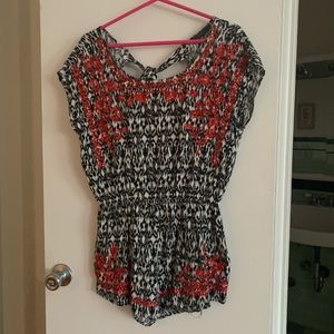 Black and white romper with red embroider detail